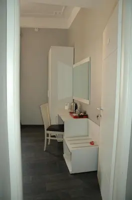 a small office with a desk and a chair at Morfeo Suite in Rome