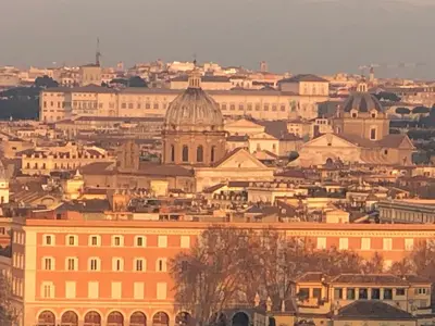 a view of a city with buildings in the background at S.Apollonia Suite Trastevere in Rome