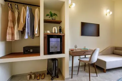 a room with a desk and a chair and a tv at Rome for Two in Rome