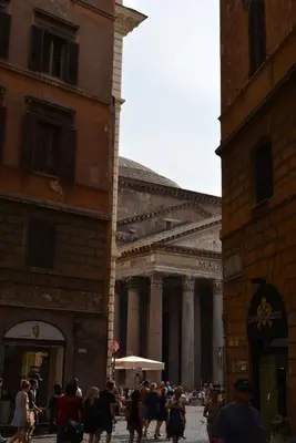 a crowd of people walking in front of a building at PantheonDreamSuite in Rome