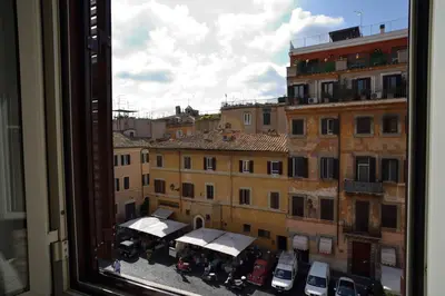 a view from a window of a city with buildings at Livia B&B - Trastevere in Rome