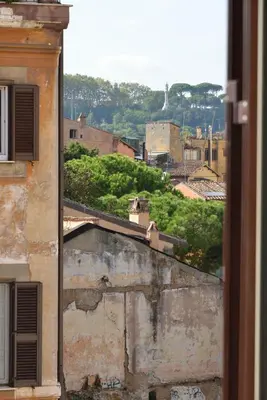 a view of a city from a window of a building at Livia B&B - Trastevere in Rome
