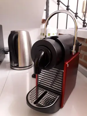 a coffee maker sitting on top of a counter at L'Oasi al Pigneto - Guest house in Rome