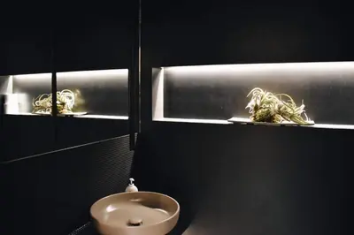 a bathroom with a sink and a urinal and a toilet at LuMa Suite Via Veneto - Your luxury style 29 in Rome