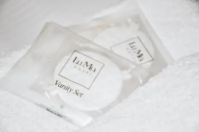two plastic bags with two candles in them at LuMa Suite Via Veneto - Your luxury style 29 in Rome