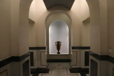 a vase sitting in a window in a hallway at ColosseoDreamApartment in Rome