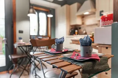 a table with two cups on top of it at B&B Papa Leone Countryrooms in Rome