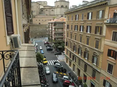 a view of a city street with cars and buildings at VaticanSky rooms in Rome