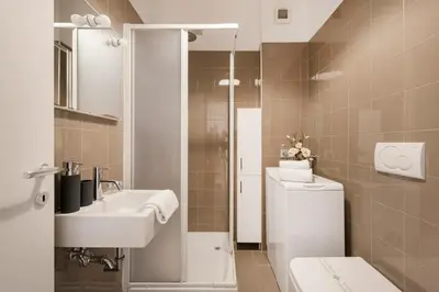 a bathroom with a toilet and a sink at World Wide Bed San Giovanni in Rome