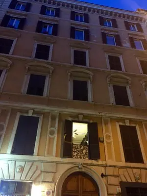 a building with a window in front of it at Dimoro Suite in Rome