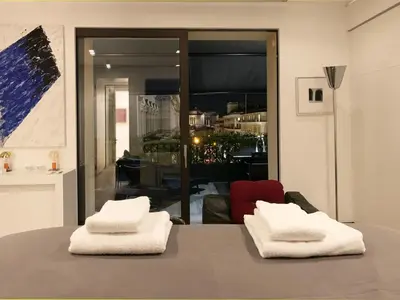 two white towels sitting on top of a table at Casa Terrazza Colosseo in Rome