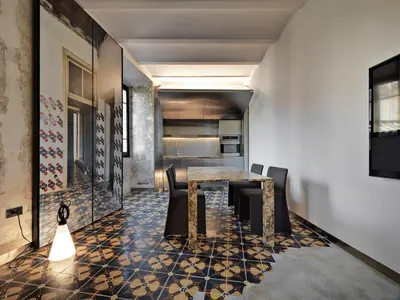a dining room with a table and chairs at Rhinoceros in Rome