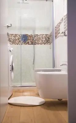 a bathroom with a shower and a tub and a toilet at La 