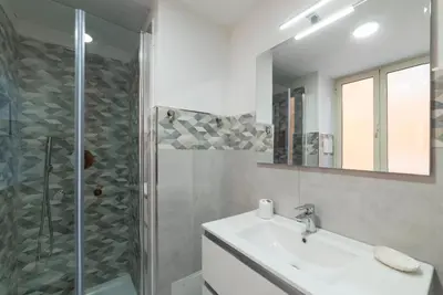 a bathroom with a sink and a shower at Avignonesi 04 - FromHometoRome in Rome
