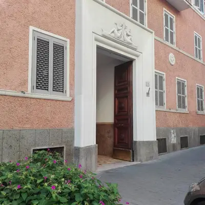 a doorway to a building with a wooden door at Casa Gaby in Rome