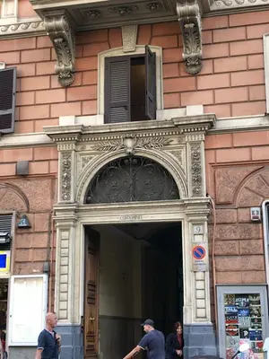 a building with an ornate entrance to a building at Ottaviano Lodge in Rome