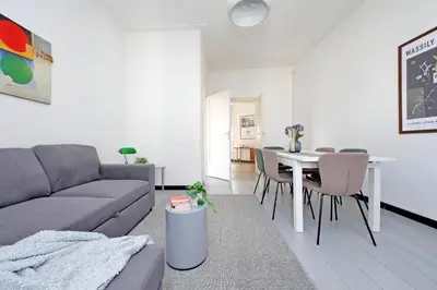 a living room with a couch and a table at Triumph Apartment in Rome
