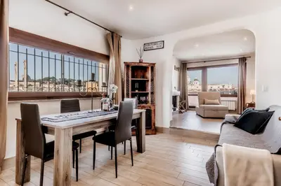 a dining room with a table and chairs at My San Pietro Home, Vaticano in Rome