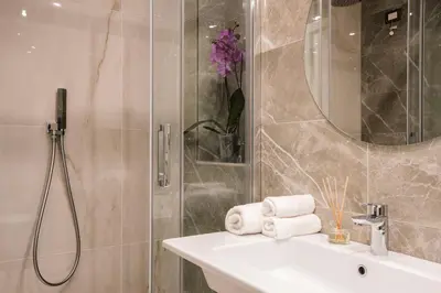 a bathroom with a sink and a shower at Residenza Venti Settembre in Rome