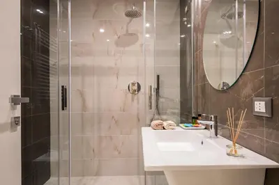 a bathroom with a sink and a shower at Residenza Venti Settembre in Rome