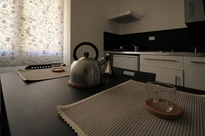 a tea kettle sitting on a table in a kitchen at Ale 160 in Rome
