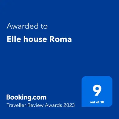 a screenshot of a cell phone with the text awarded to elle house roma at Elle house Roma in Rome
