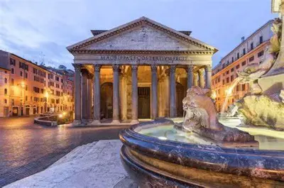 a statue in front of a building with a fountain at Guest House o Affittacamere La Civetta di Trastevere B in Rome