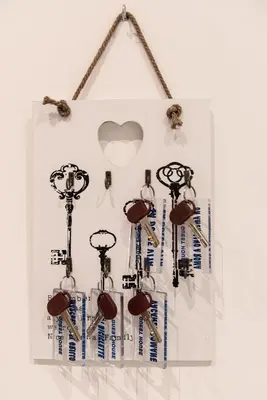 a group of keys hanging on a wall at Eden guest house in Rome