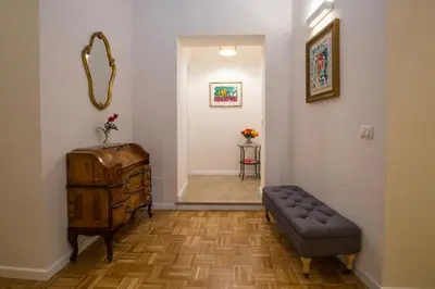 a living room with a couch and a table at Your Secret Pantheon in Rome