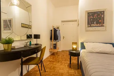 a bedroom with a desk and a bed and a desk at Your Secret Pantheon in Rome