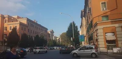 a street sign on the side of a city street at B&B Lumiere Roma in Rome