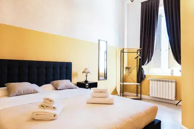 a room with a desk with a computer on it at B&B Lumiere Roma in Rome