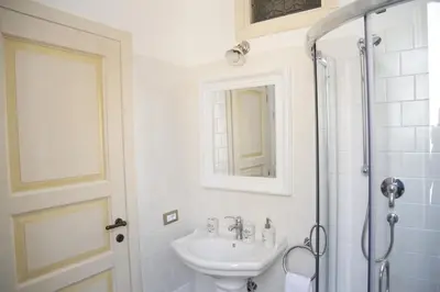 a bathroom with a sink and a shower at Bed and Breakfast 30 in Rome