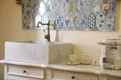 a kitchen counter with a sink and a coffee maker at Bed and Breakfast 30 in Rome