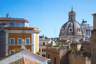 a view of the roofs of buildings in a city at Rent in Rome - IV Novembre in Rome