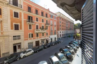 a view of a street with parked cars and buildings at Filomena Arthouse in Rome