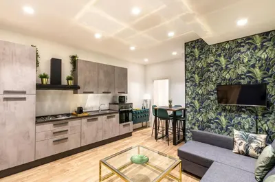 a living room with a couch and a table at Lovely Rome Apartments - Historic City center in Rome