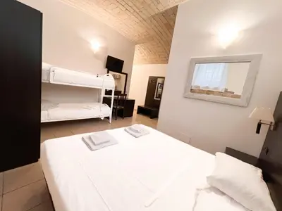 a bedroom with two bunk beds in a room at Saint Peter Loft in Rome