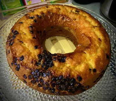 a bundt cake sitting on a glass plate at Le Vie del Vaticano in Rome