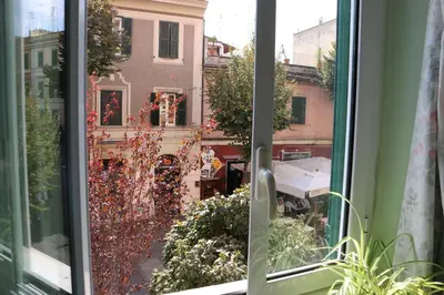 a window with a view of a city street at your Rome basic but bonnie corner in Rome