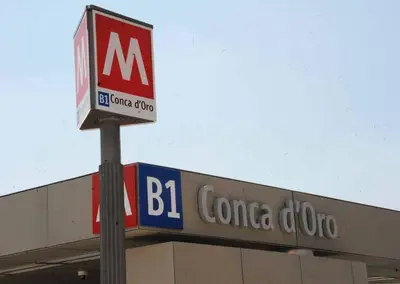 a sign on the top of a building with a colombooco sign at City Break Nomentana in Rome