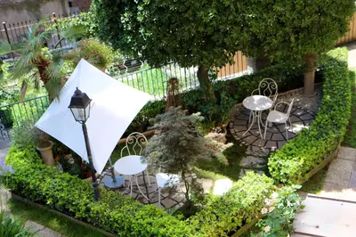 an overhead view of a garden with tables and chairs at Villa Matissa Apartments in Rome
