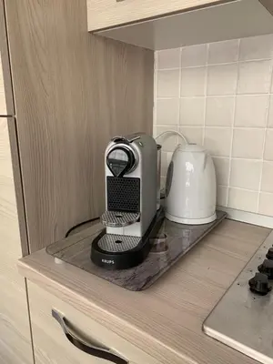 a mixer sitting on a counter in a kitchen at Villa Matissa Apartments in Rome