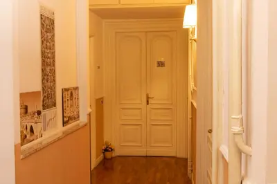 a hallway with a white door in a room at Annette B&B in Rome