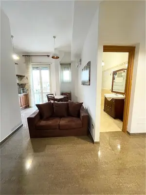 a living room with a couch and a table at INTERNO DIECI in Rome