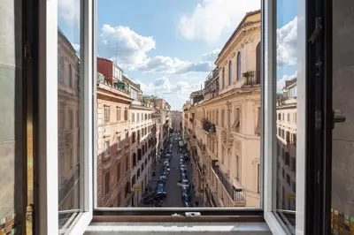 a view of a city street from a window at 900 Apartments Veneto & Pinciana in Rome