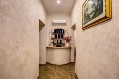 a hallway with a bar in a house at AMICI GUESTHOUSE in Rome