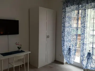 a room with a cabinet and a window at 550 Special home in Rome