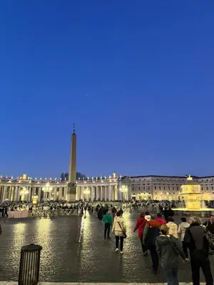 a group of people walking in front of a building at San Peter Apartment - your home in the heart of Rome in Rome