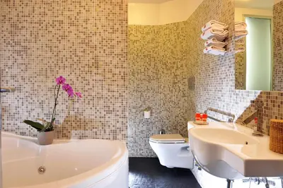 a bathroom with a tub and a sink and a toilet at B&B Best Pantheon in Rome